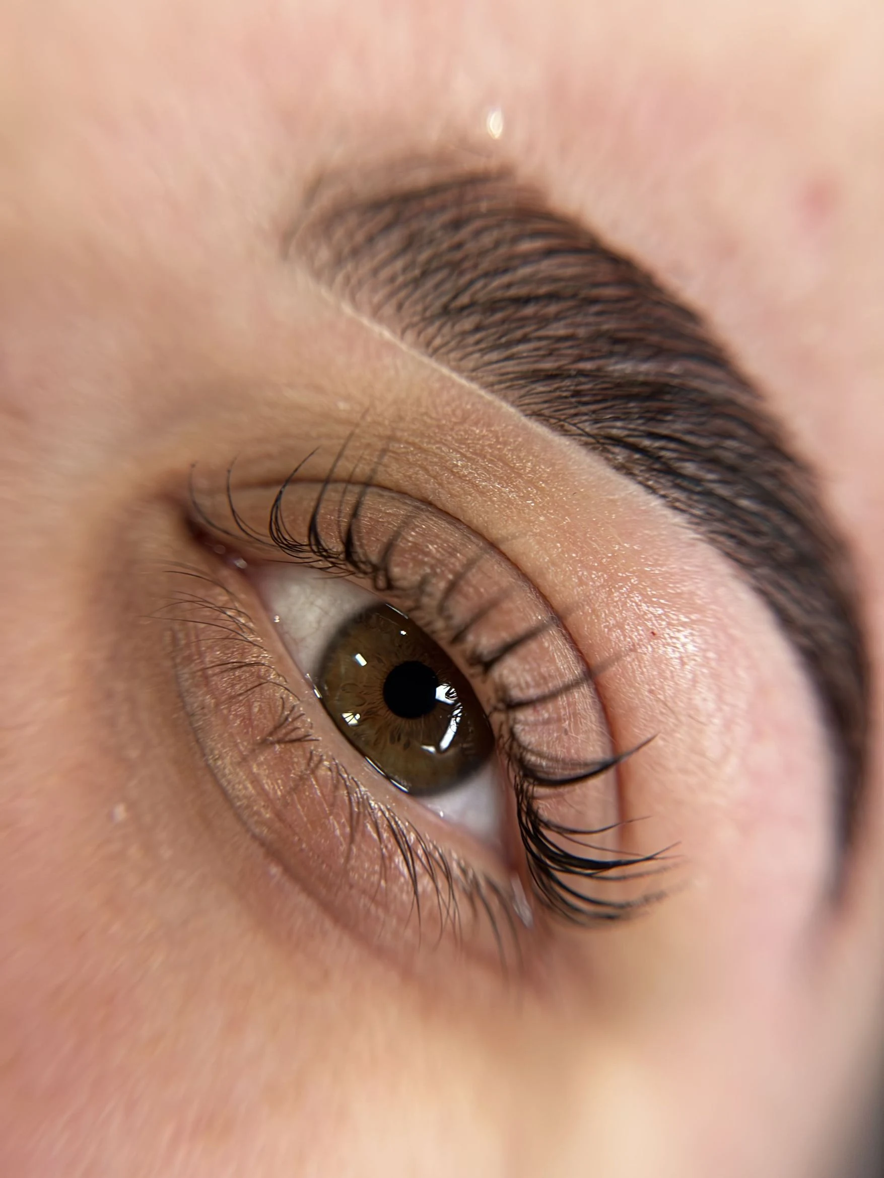 Natural brow lamination on an open eye